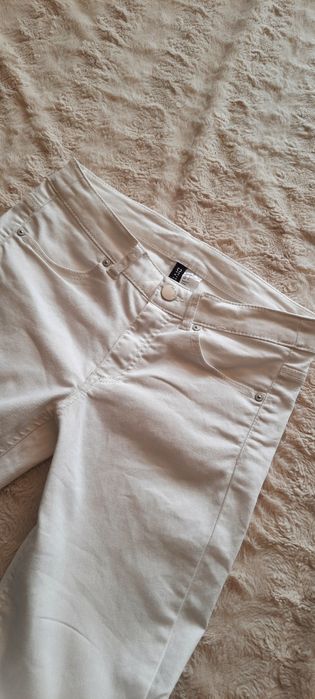 Białe spodnie skinny jeans H&M rozmiar 36