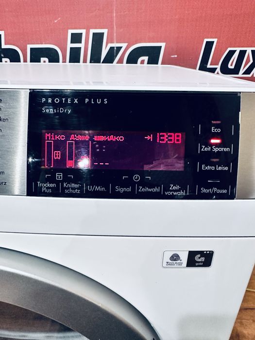 Сушильна машина AEG 8кг ( тепловий насос)