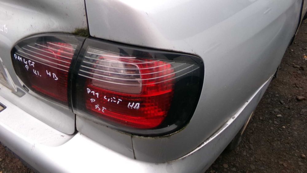 Cze66 Lampa prawa tylna w błotnik nissan primera p11 EU HB lift wysyłka