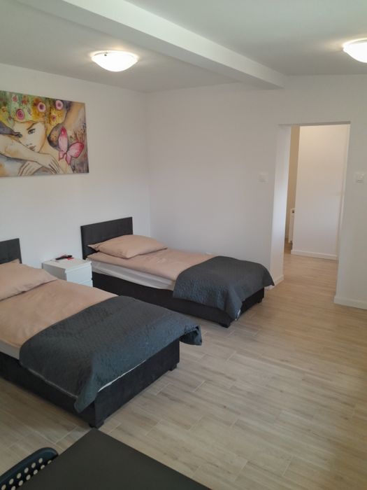 Pokoje gościnne Agawa usługi noclegowe.