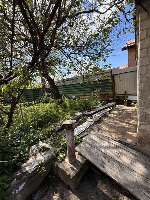 Ділянка із будиночком у Шевченківському мкрн.