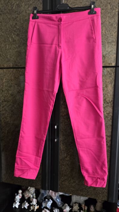 Różowe spodnie damskie M.
