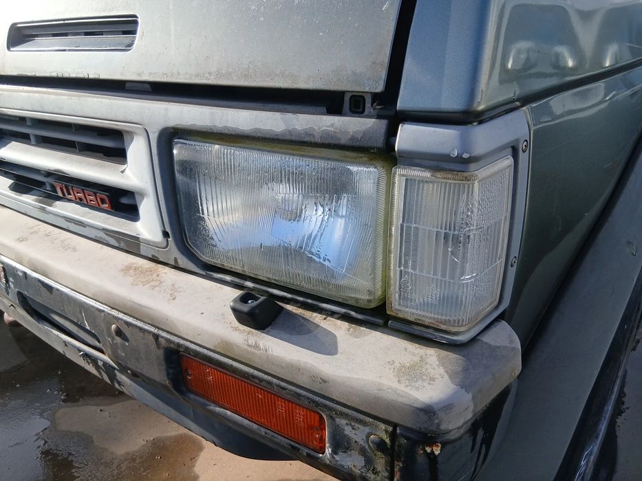 Ótica / farol esquerda NISSAN Terrano I (WD21)