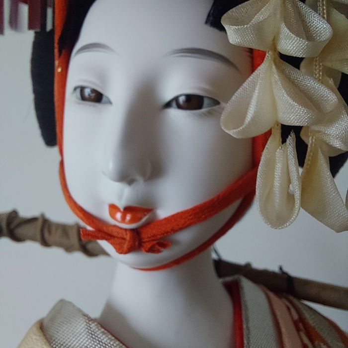 Boneca cerâmica japonesa