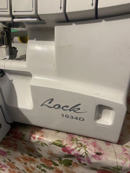 Оверлок на 4 нити  металлический  брендовый настроенный