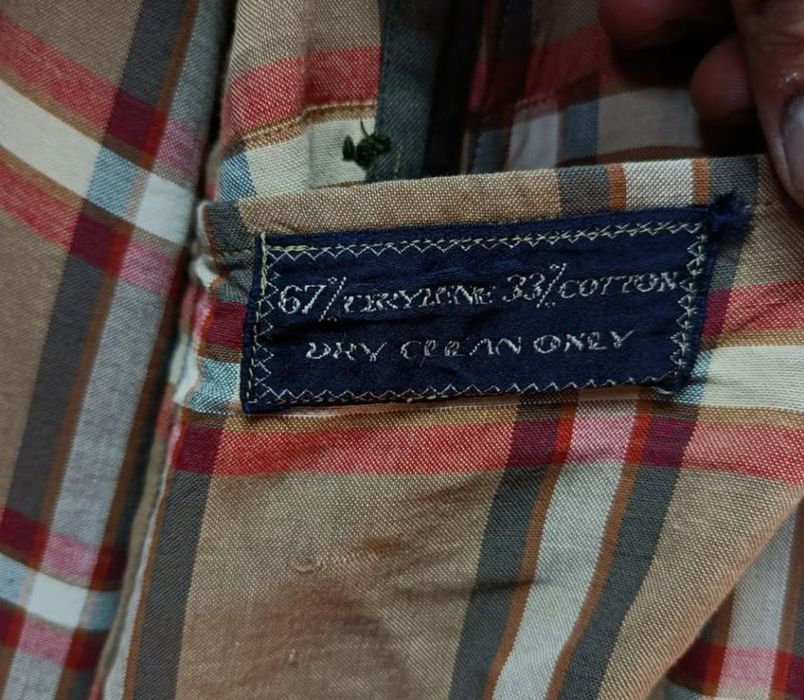 Плащ від бренду Burberry
