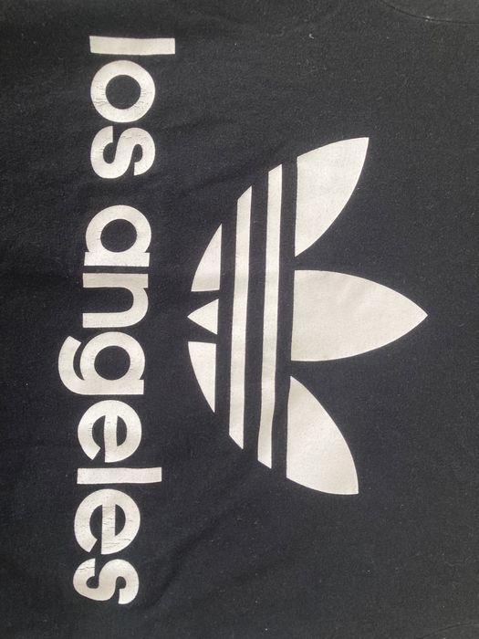 Czarna koszulka bluzka z krótkim rękawkiem t-shirt z białym napisem lo