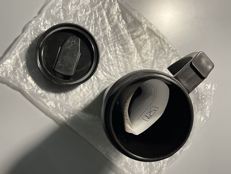 Kubek termiczny z napisem. Nieużywany