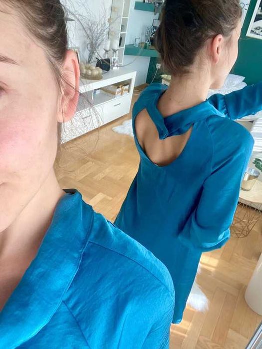 Elegancka turkusowa sukienka Stile Benetton