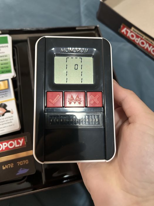 Jogo de Tabuleiro Monopoly Ultimate Visitar > Banking