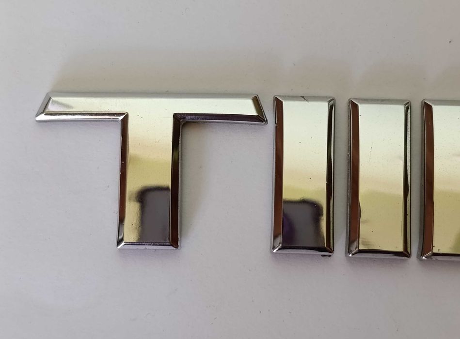 Napis emblemat Nissan Tiida I 04-12r