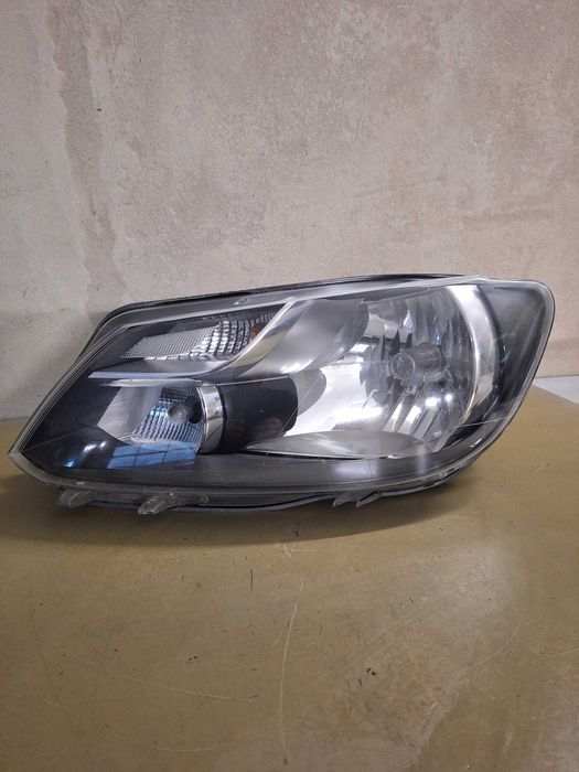 lampa lewa vw caddy III 2k 2010-,2015r HELLA europa