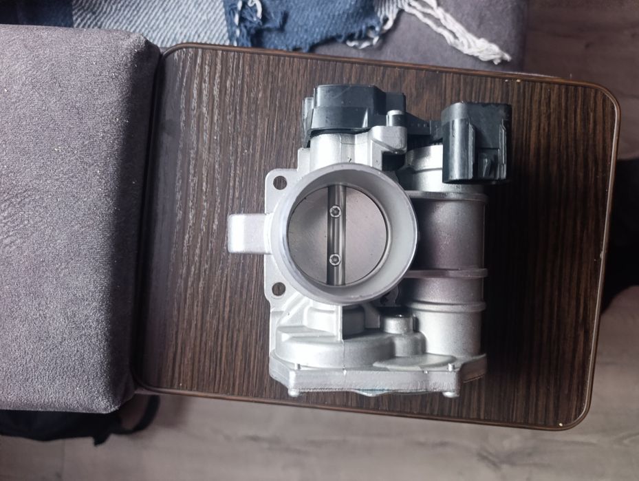 Дросільна заслонка 2115 Нова