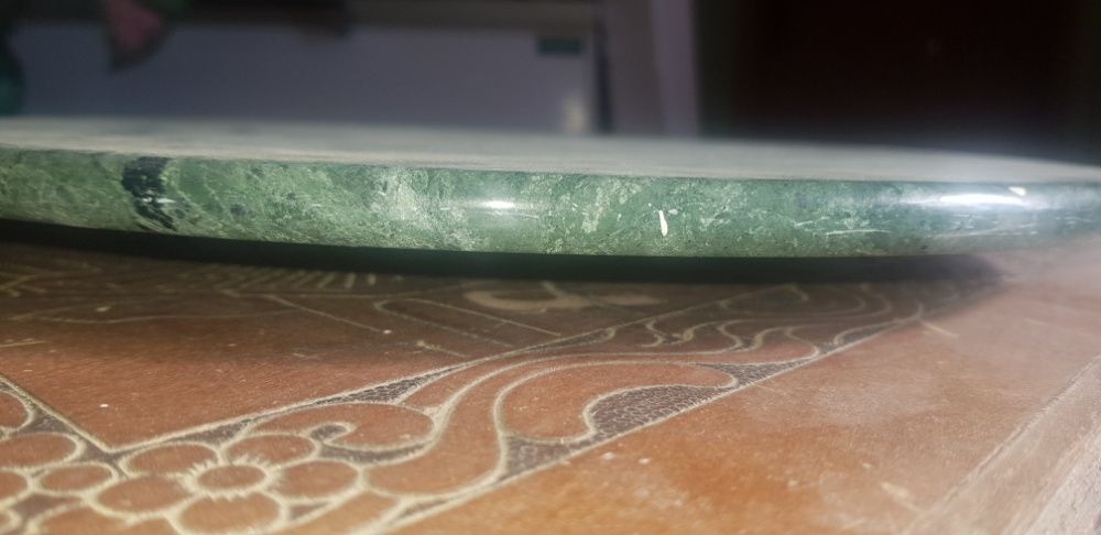 Centro de mesa giratorio em pedra