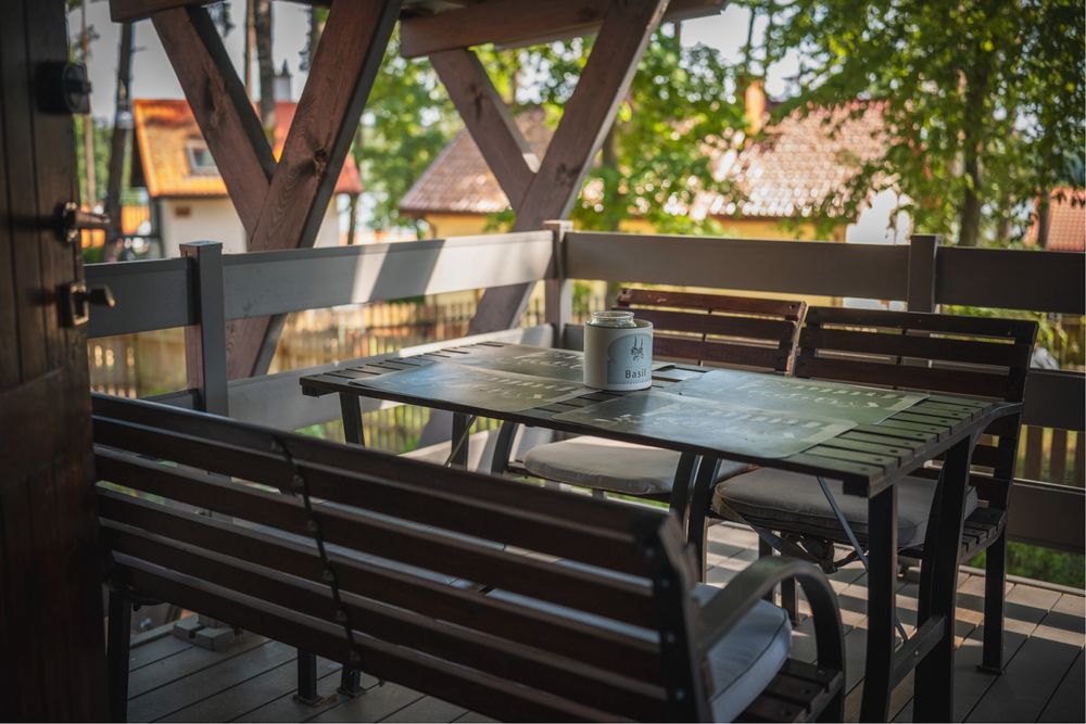 Domek nad jeziorem Warmia i Mazury łódka pomost