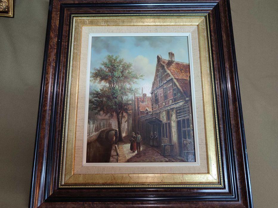 Pintura a óleo sobre o tema "Dutch Town by a Canal"