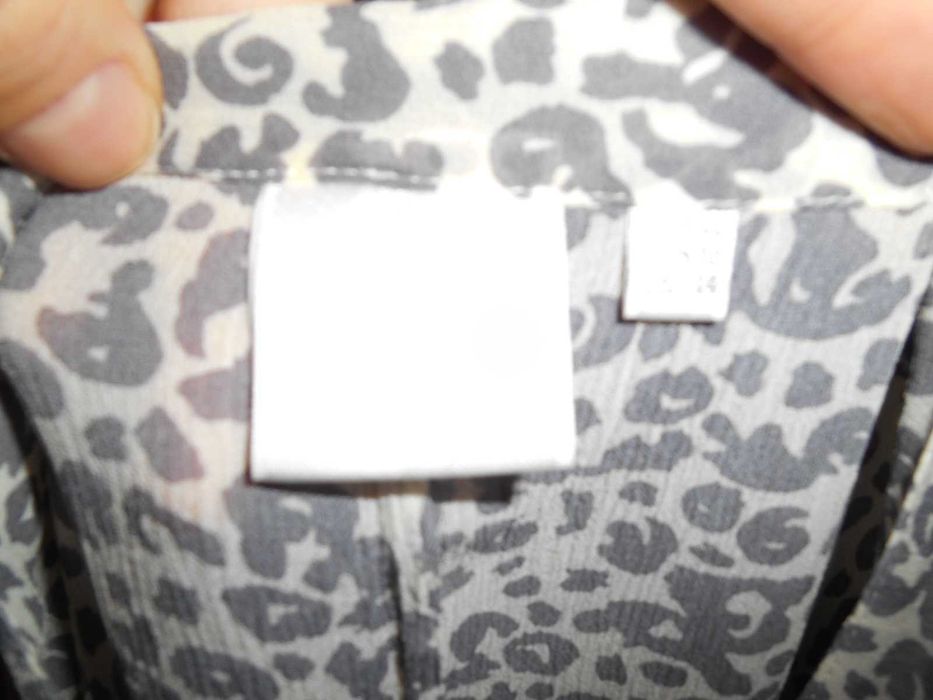 блузка цікавого кроя 48 размер