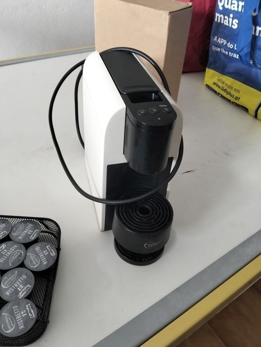 Máquina de cápsulas.