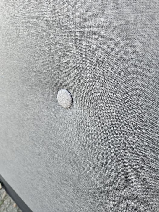 Szare tapicerowane łóżko 160x200 rama