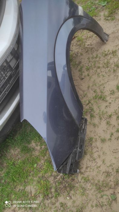 Opel Vectra C polift błotnik lewy
