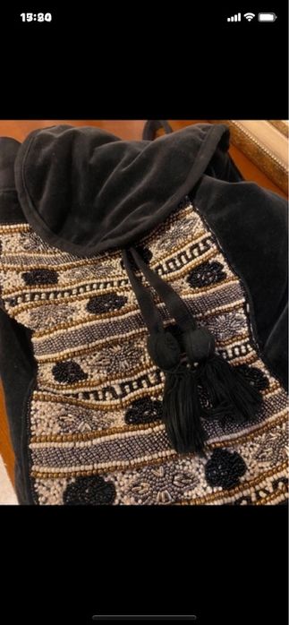 Mochila preta veludo.