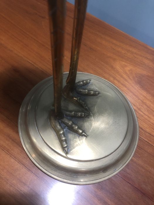 Par de garcas e latao