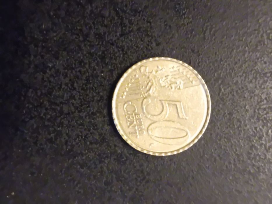Moeda portuguesa com defeito