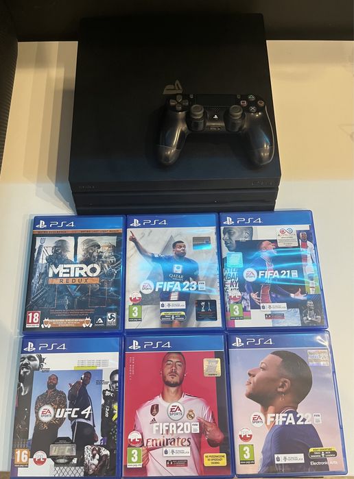 PS4 PRO 1 TB + pad + 6 gier