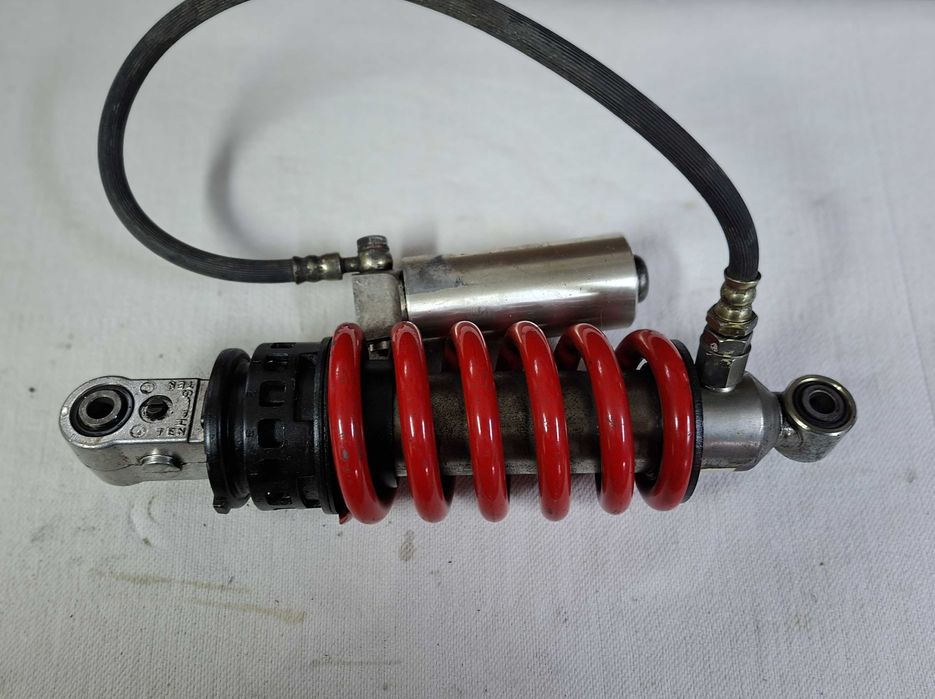 Amortecedor Showa MAL-G01 e Apoio oscilante F MV9
