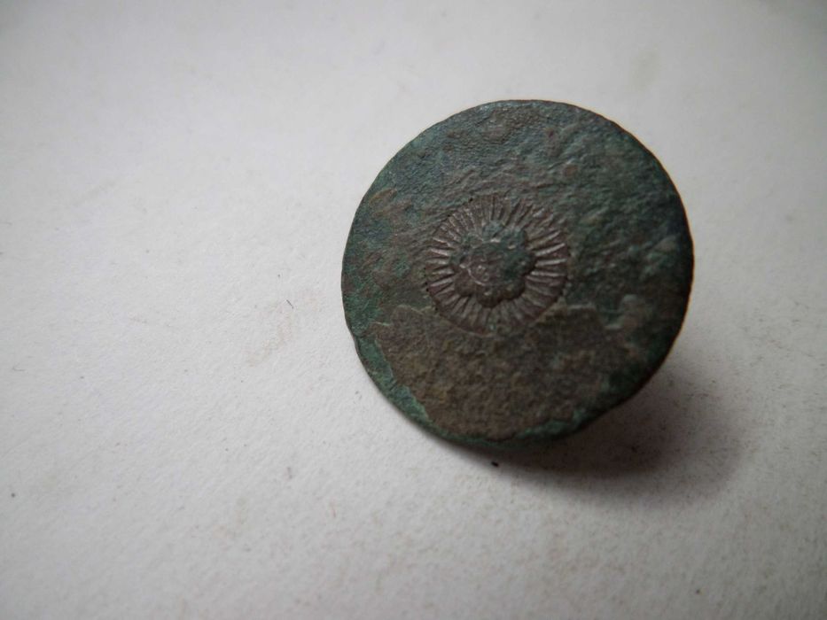 Botão antigo em Metal