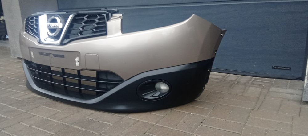 Zderzak przód przedni Nissan Qashqai J10 Lift zderzak grill  halogen