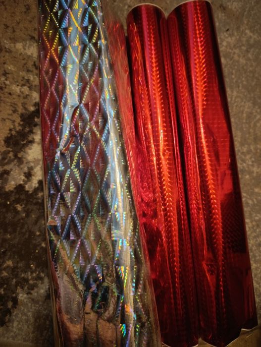 Начатые рулоны самоклейка блестящей.