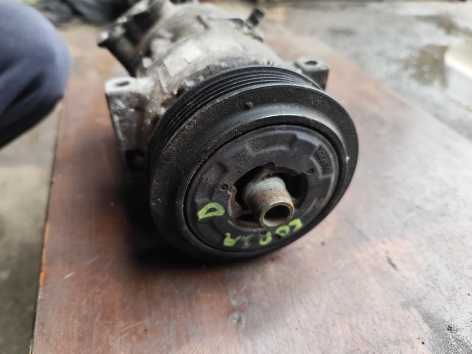 Opel Corsa D kompresor sprężarka klimatyzacji  55.701.200