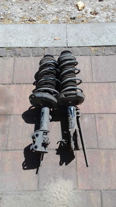 Amortyzator lewy prawy MCPERSON Opel Corsa D