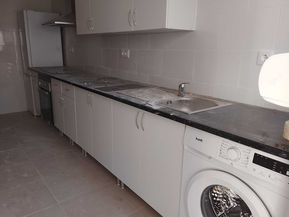 Apartamento T1 R/C renovado com quintal em Odivelas