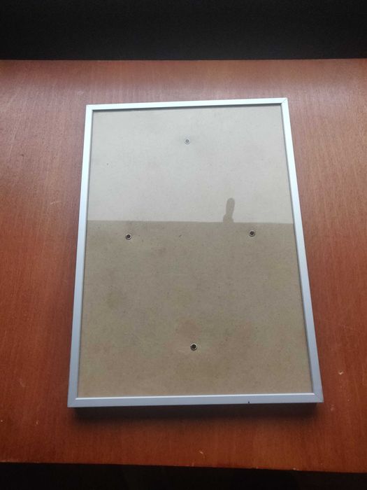 Moldura com aro metalico