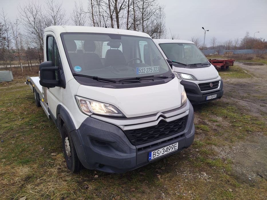Transport pojazdów / towarów Autolaweta Pomoc drogowa