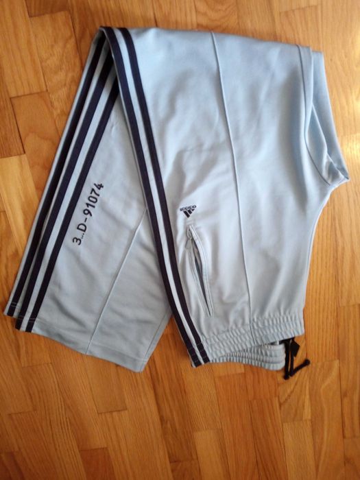 Calças Adidas azul claro julgo que unisexo