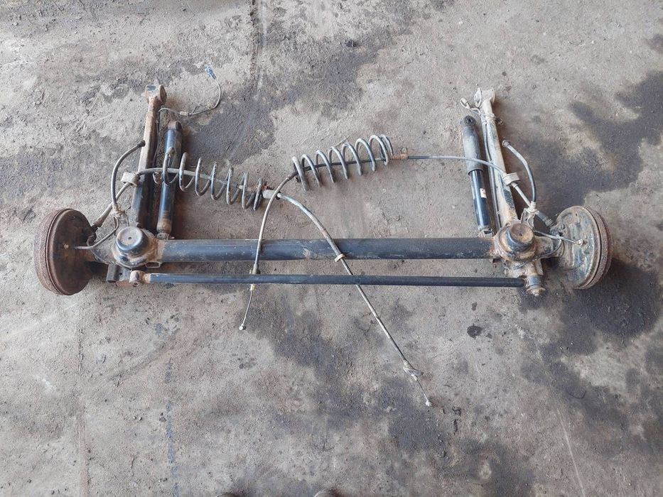 BELKA OŚ ZAWIESZENIA TYŁ BĘBNY Z ABS SUZUKI IGNIS II