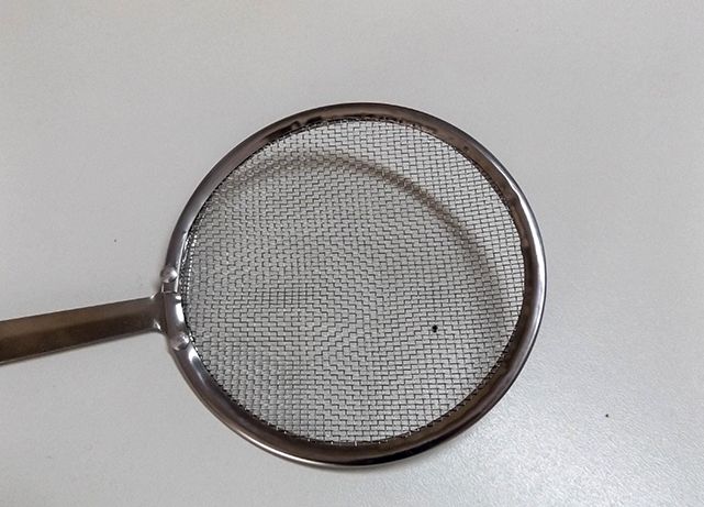 Escumadeira em inox para a cozinha – Nova