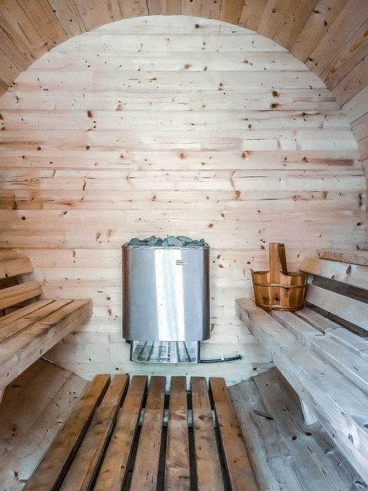 Domki letniskowe z kominkiem, jacuzzi i sauną.