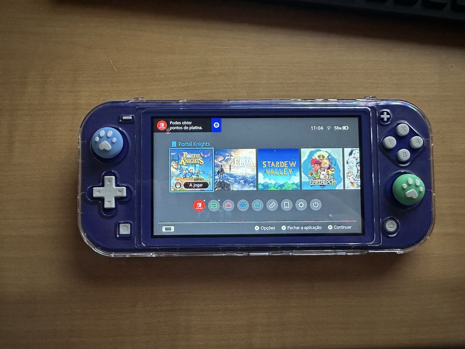 Nintendo Switch Lite + 2 jogos e extras