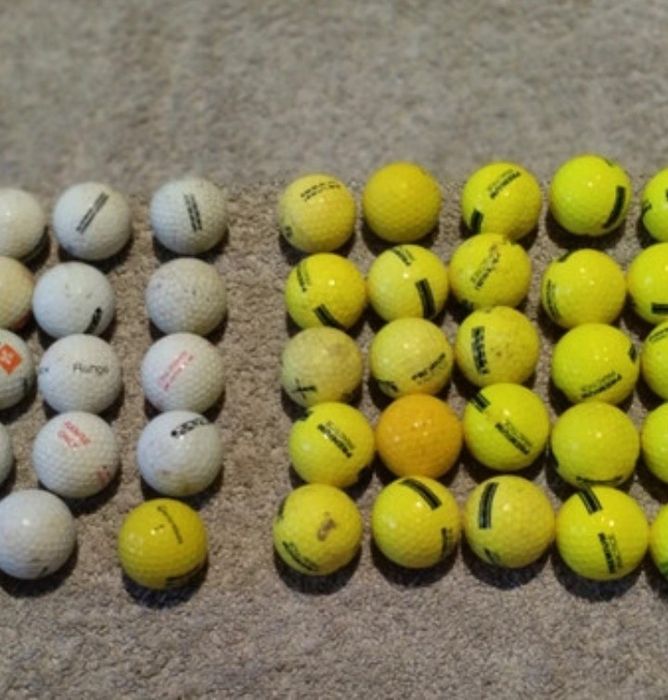 Lote com 70 bolas de golfe usadas e novas.