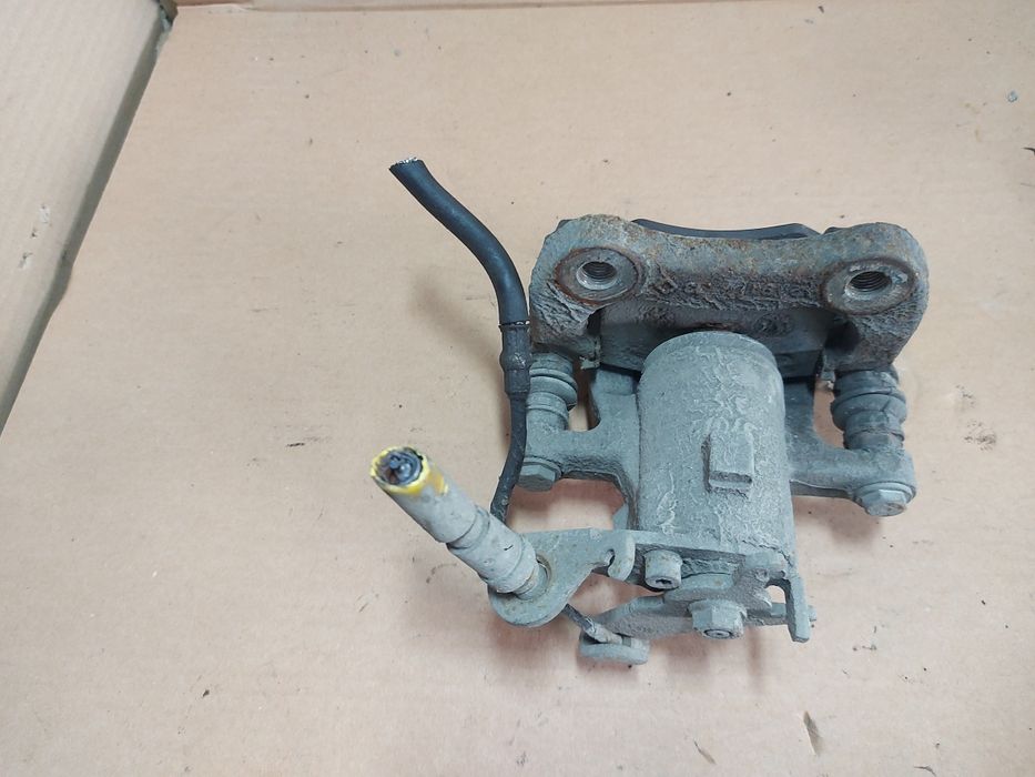 / Megane III 3 zacisk hamulcowy lewy tył