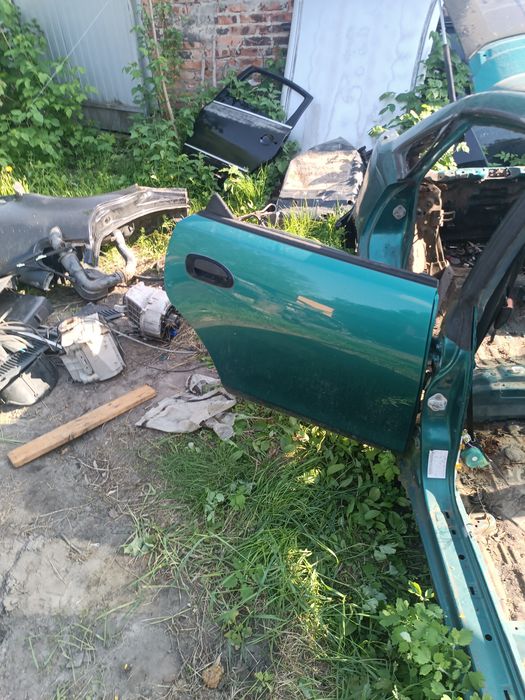 Двері Mazda 323 BA