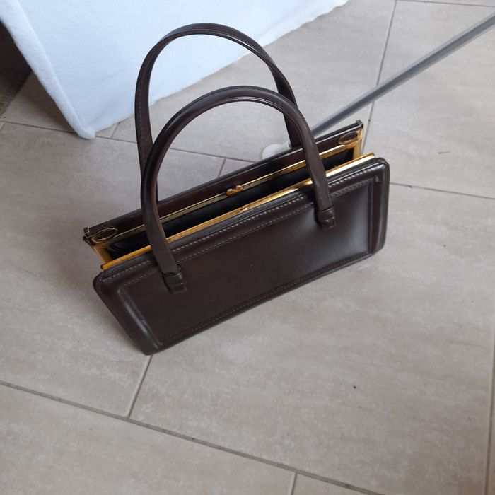 Carteiras como novas