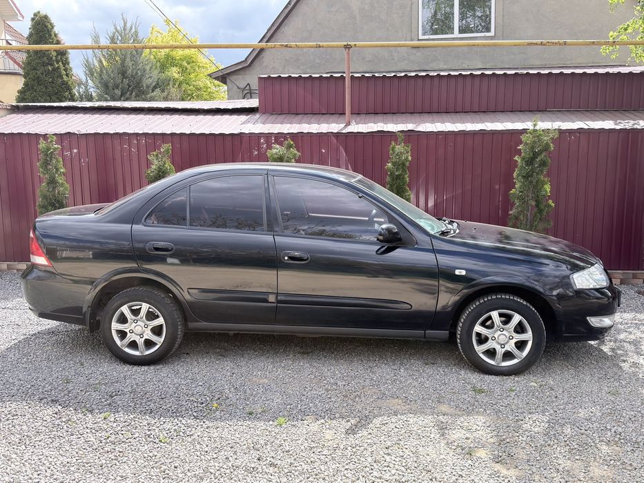 Nissan Almera Classic 2006г.1.6 газ/бензин.Кондиционер.