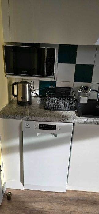 Nowoczesny apartament z  widokiem na morze i basenem.