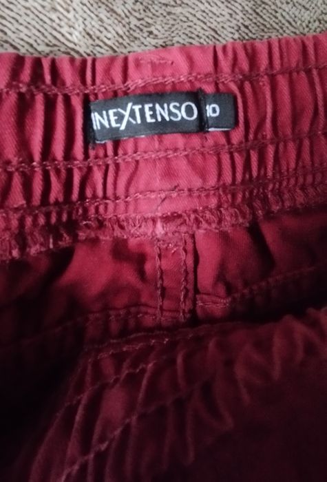 Bordowe spodnie roz. 140