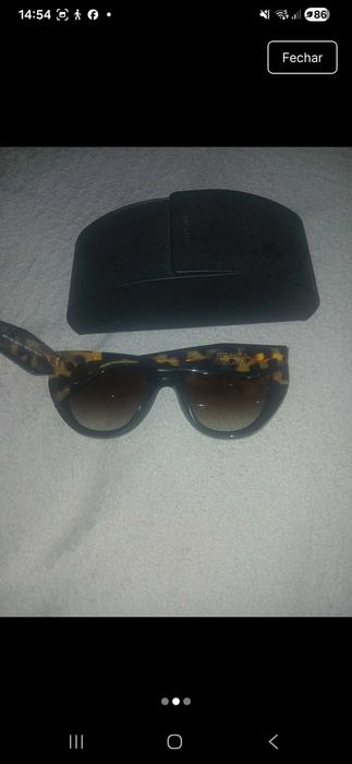 Óculos sol Prada